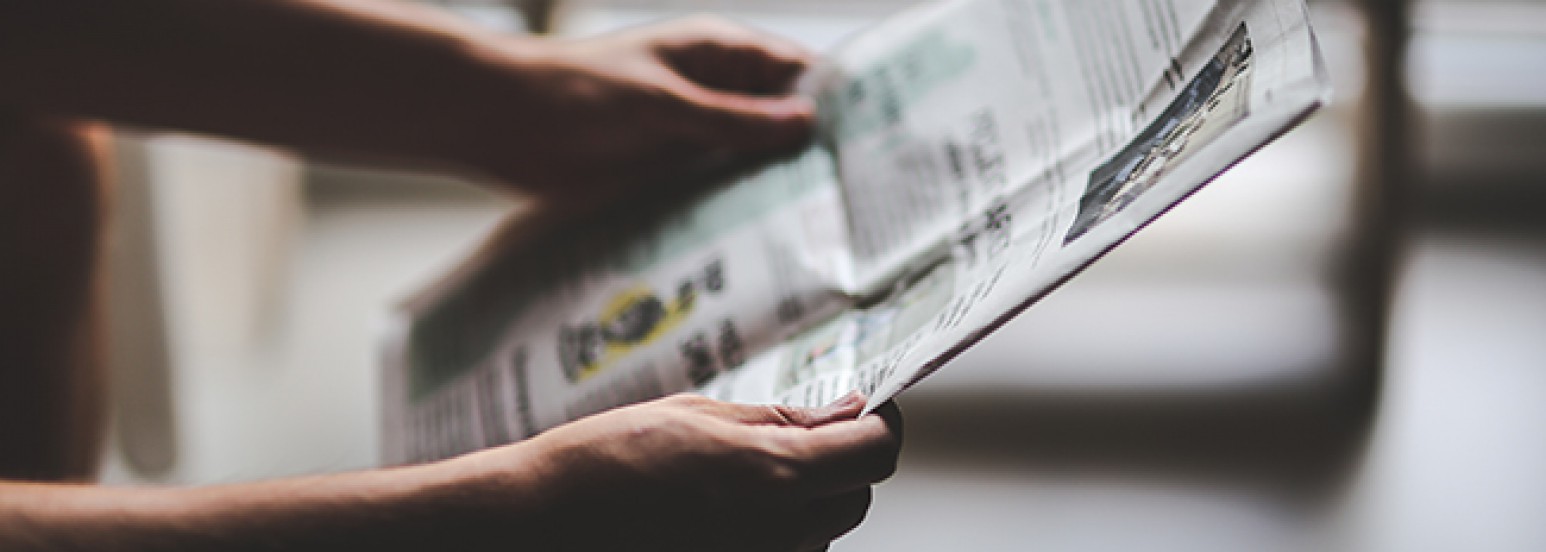 Newspaper in hands