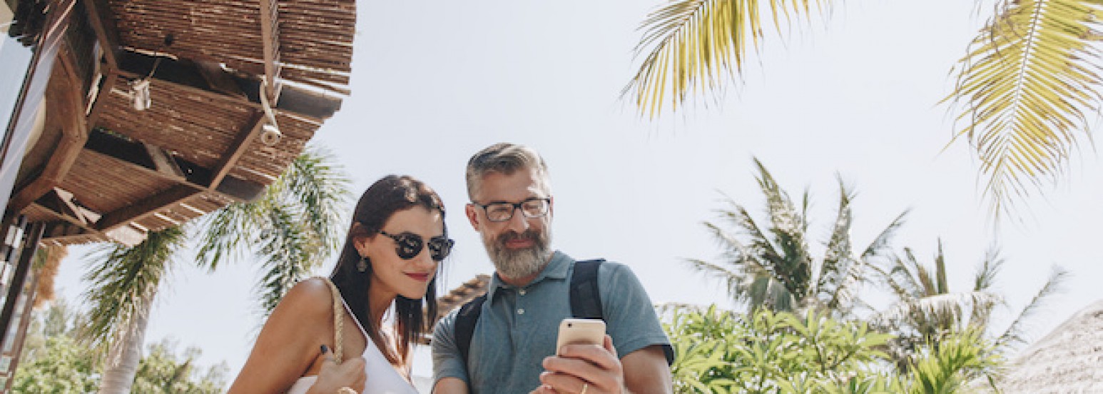 Travelers using mobile app